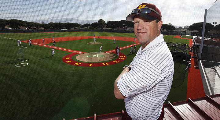 Dan Teresa looking over the new sustainable turf on baseball and softball fields.